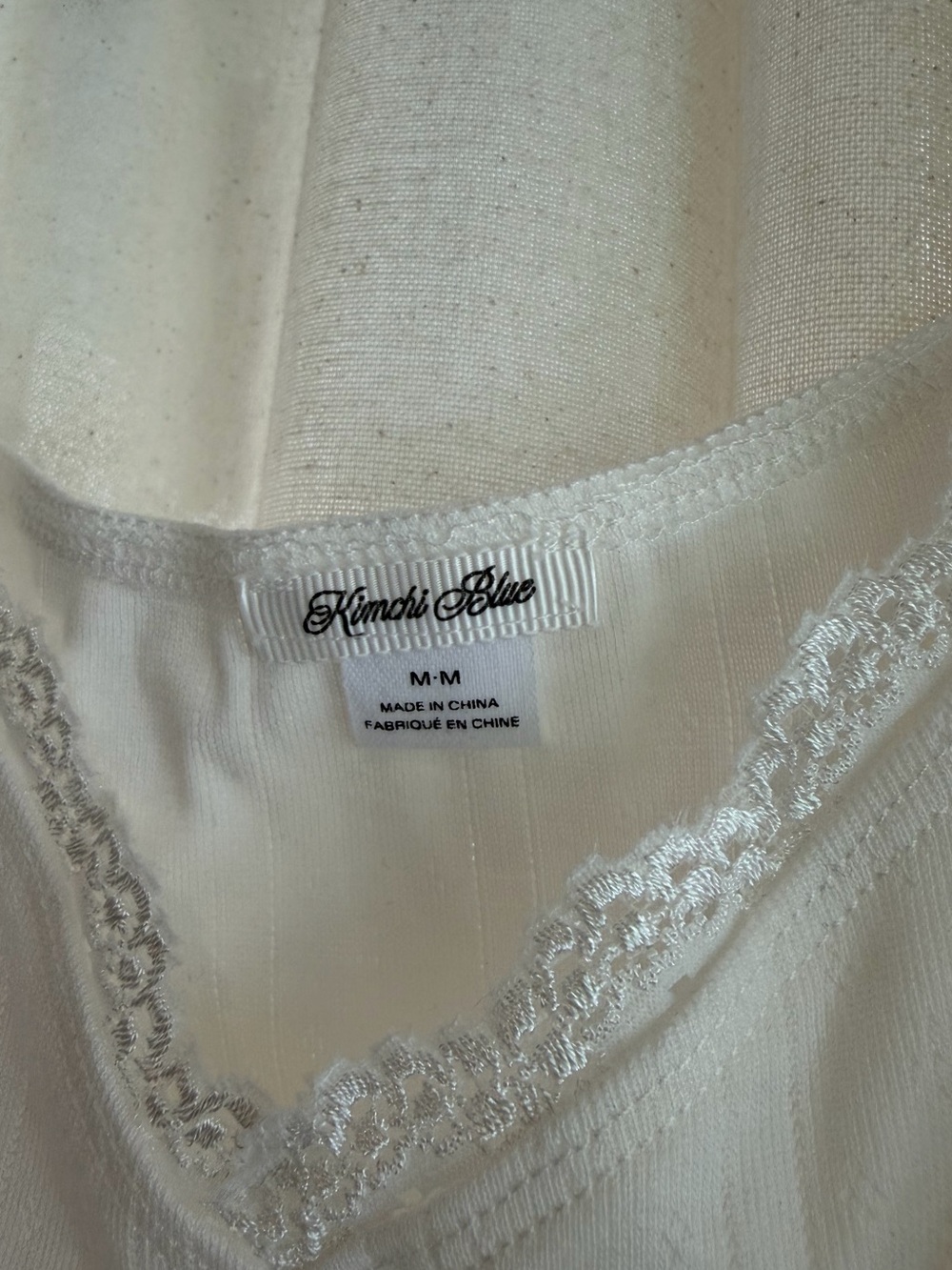 UO Kimchi Blue Posie Pointelle Knit Lace-Trim Ruffle Top in Ivory - Picture 8 of 9
